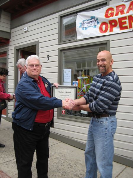 File:Mayor Jones welcome Keith Marks to the downtown business district 2012.jpg