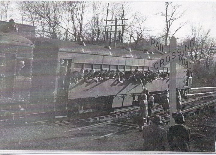 File:Doodlebug gas-electric motor cars powered this train full of military men.jpg