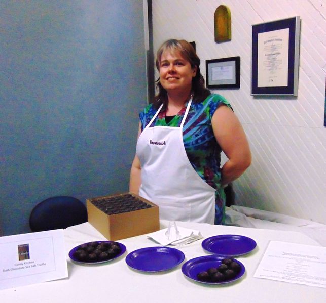 File:Main Street Wine and Chocolate Walk 2018, Samantha Francis of Five Dances Wellness Center gives out some chocolate, May 12, 2018.JPG