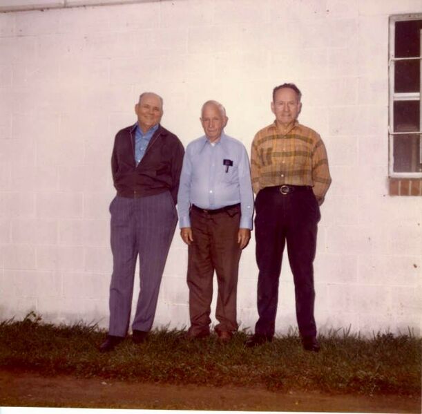 File:Buck Gladstone, Dutch and Charlie Halley outside of Dutch's Motoguzzi motorcycle dealership.jpg