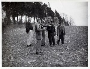 Christmas Tree Cutting Man with ax.jpeg
