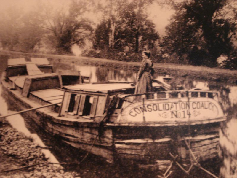 File:Canal - a woman was usually at the tiller of canal boat.jpg