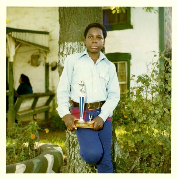 File:Bernie Lipscomb showing off his baseball trophy.jpg