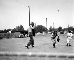 Frederick catcher scrambles after a passed ball 1955.jpg
