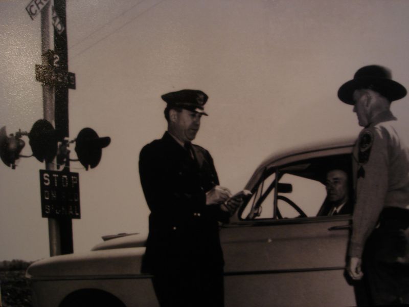 File:Officer M.E. McGaha from the B&O police on the left with freight agent E.E. Bowers in the car. (May 1952).jpg