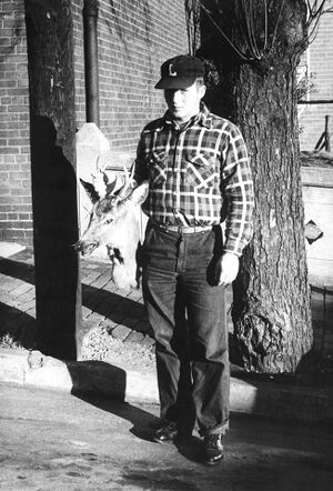 Unidentified - Local Kid showing off his trophy.jpg