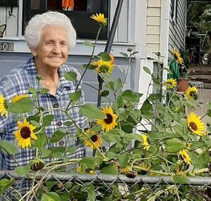 Frances Axline in her garden.jpeg