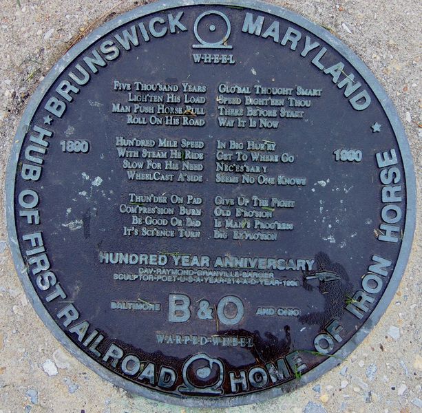 File:Raymond Barger Plaque on Warped Wheel Sculpure at the Brunswick Library.JPG