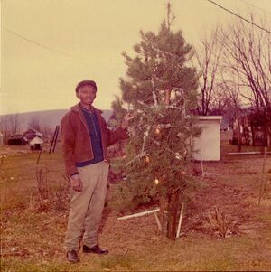 Shorty Jackson showing off some Christmas decorations.jpg