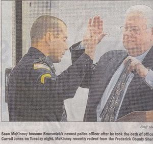 Shawn McKinney Sworn in by Mayor Jones in 2011.jpg