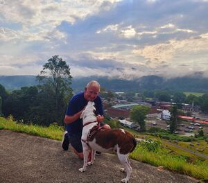 Jerry Knight with Boozer the Wine Dog.jpeg