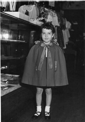 Brenda Biller (Wiggins) showing off her new red cape.jpg