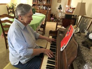 Betty Richardson plays her home piano. Photo By Wyatt Massey.jpg