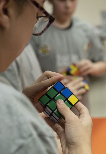 File:Members of the Brunswick Middle School Cube Slayers team race to solve 25 Rubik's Cubes, March 2, 2019 (2).jpg