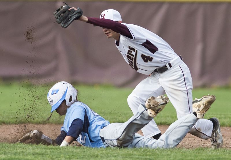 File:Baseball 2016, Connor Kean tags out Catoctins Nick Ford during 9-2 win May 9 2016 Photo Frederick News Post, photo Graham Cullen.jpg