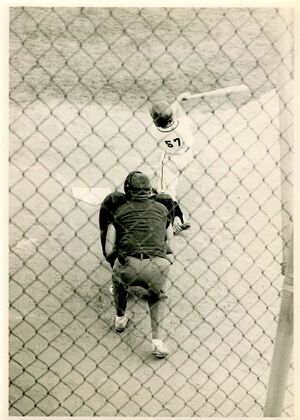 Cubs batter takes a swing circa mid 1950s.jpg