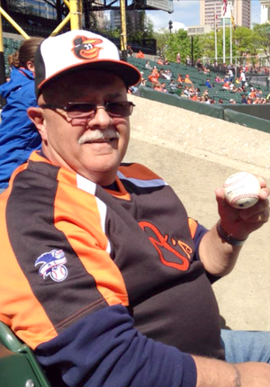 Denny Moore of Brunswick holding the game ball.png