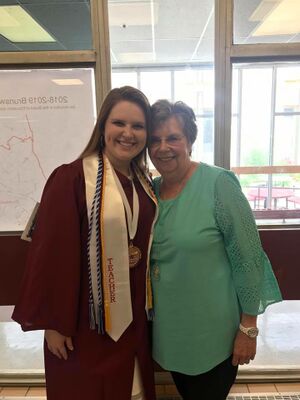 Alexis Bruchey (Graudate) and Robby Simmons May 2018.jpg