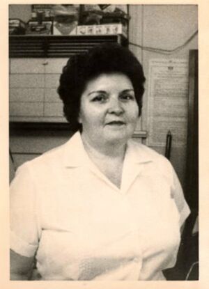 Evelyn Gletner in uniform at Ivan’s Beauty Shop.jpg