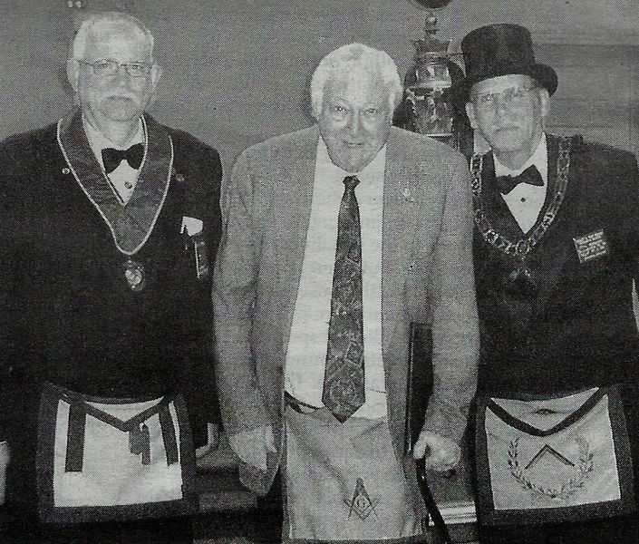 File:Masons - Brother Donald H. (King) Campbell is presented with his 50 year service pin and certificate 2014.jpg