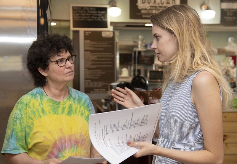 File:Main Street 2019 Sophie Smith talks with Karin Tome of Towpath Creamery from The Frederick News-Post, July 29, 2019.jpg