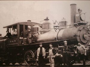 Train with Railroad Worker in front and in the engine.jpg