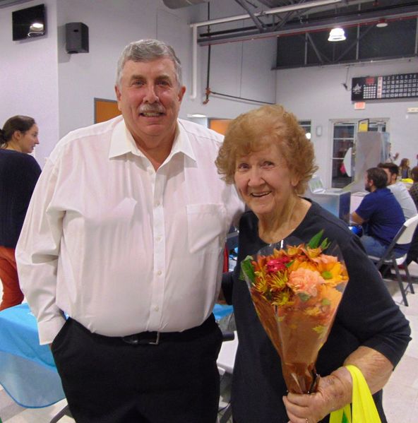 File:Charles Thornton, CPS and Oneida Heffner of H&R Block discuss old times in Brunswick at the Expo, November 7, 2019.jpg