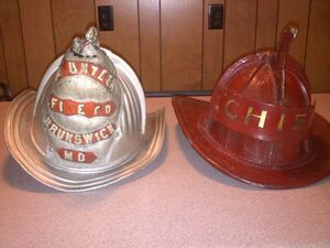 Fire - Pair of Brunswick fire helmets Circa 1950.jpg