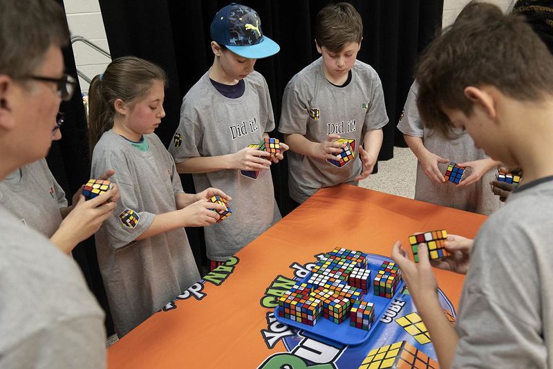 File:Members of the Brunswick Middle School Cube Slayers team race to solve 25 Rubik's Cubes, March 2, 2019 (3).jpg