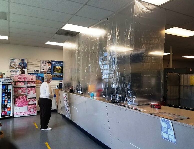 File:Pandemic 2020 Post Office is open but a special barrier between customer and staff, April 8, 2020.jpg