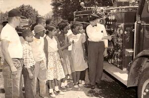 Kids view the 1953 LaFrance pumper - mid-1950s.jpg