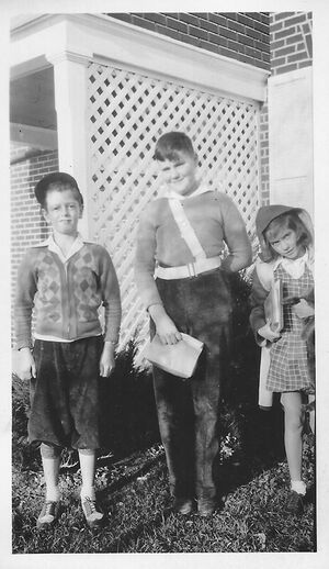 Bill Wenner proudly shows off his school bus patrolman's badge.jpg
