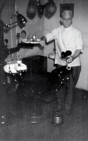 Dr. William L. Lloyd in his dentist's office.jpg