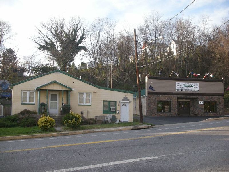 File:Pool hall (left) operated by Ed Payne and Shelley's Cleaners (right) owned and run by Shelley Dawson..jpg