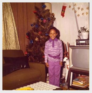 Michelle Lipscomb posing in front of her tree.jpg