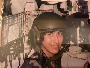 Captain Jennifer Shafer-Odom on board an aircraft.jpg