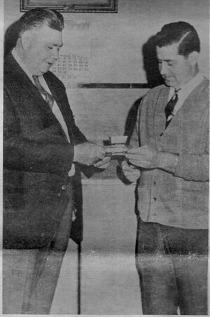 Mayor Orndorrf presents check to Shelley Dawson.jpg