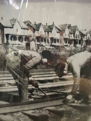 Workmen laying track in the east end.jpg