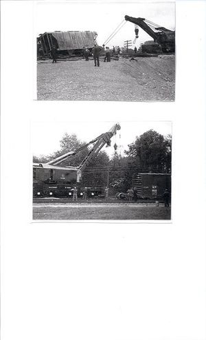 Wrecking crew called out to clean up train wreck..jpg