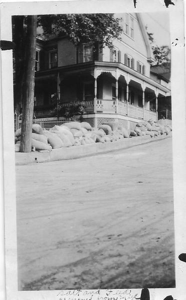 File:Flood 1924, Sidewalk alon MD Ave, Brunsiwck showing salt and feed removed from mill at 1 A.M. May 14, 1924, Gross House.jpg