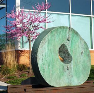 Raymond Barger Wheel Sculpture in front of the Brunswick Library.jpg
