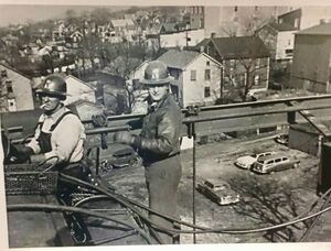 Bridge workers high above South Virgina Avenue.jpg