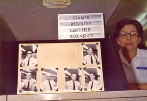 Post Office, Mary Cook with photo of Post Office Staff.jpg