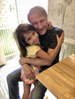 Bill Turney and granddaughter Caroline.jpeg