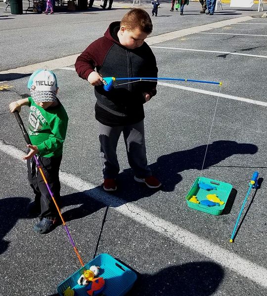 File:New Hope Church Easter Event 2018, Chase Kidd from Brunswick and Elliott Trawick from Frederick go some serious fishing, March 31, 2018.jpg