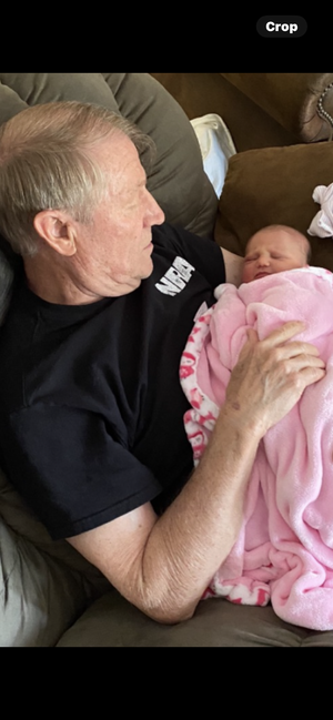Bill Turney & great-grandchild London.png