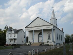 St. Mary's Roman Catholic Church and the parsonage in Petersville..jpg