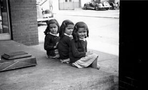 Unidentified - Triplets on the steps of Kaplon's Department Store Circa 1930s.jpg