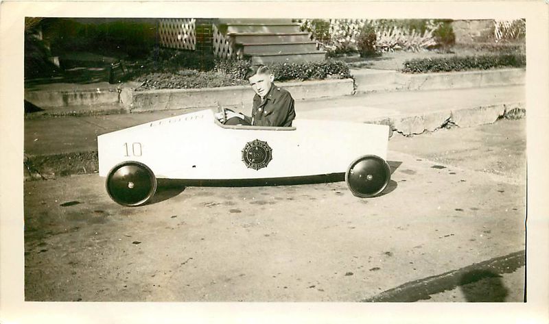 File:Soapbox derby racer in his American Legion sponsored car..jpg